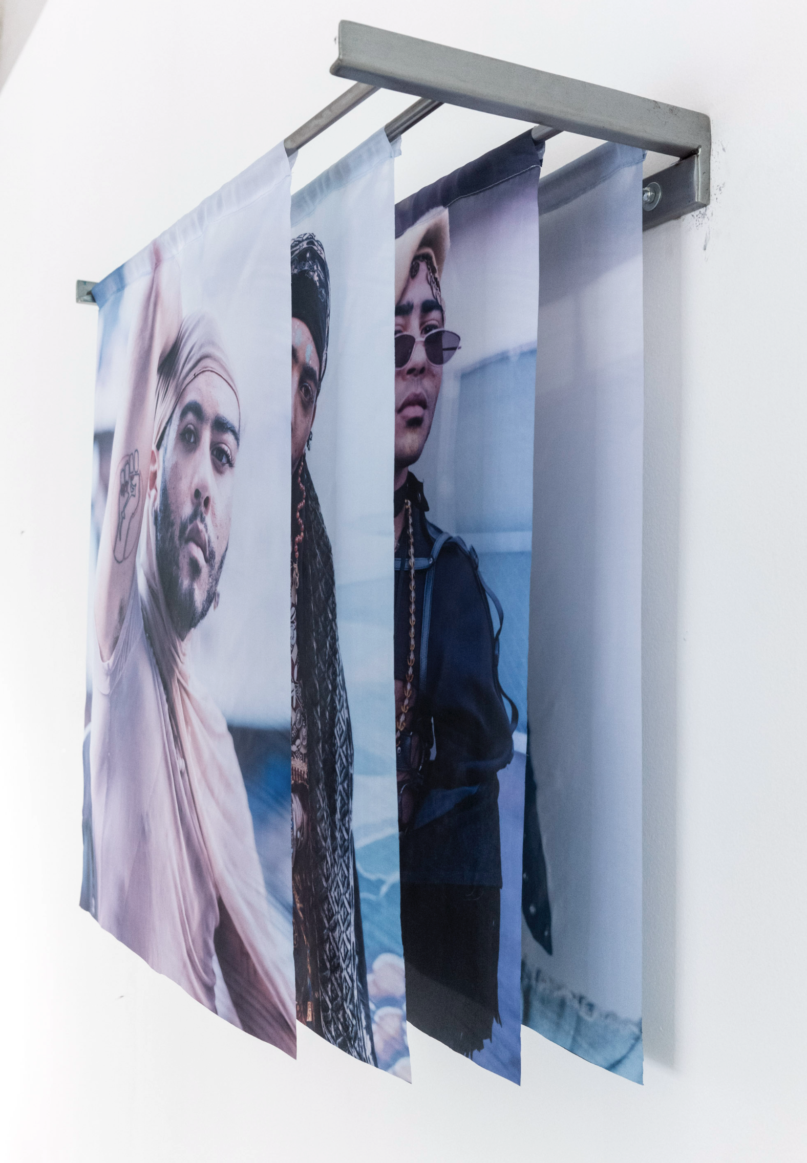Monte Nettles portrait installation — four panels on custom steel rod, MMACJS