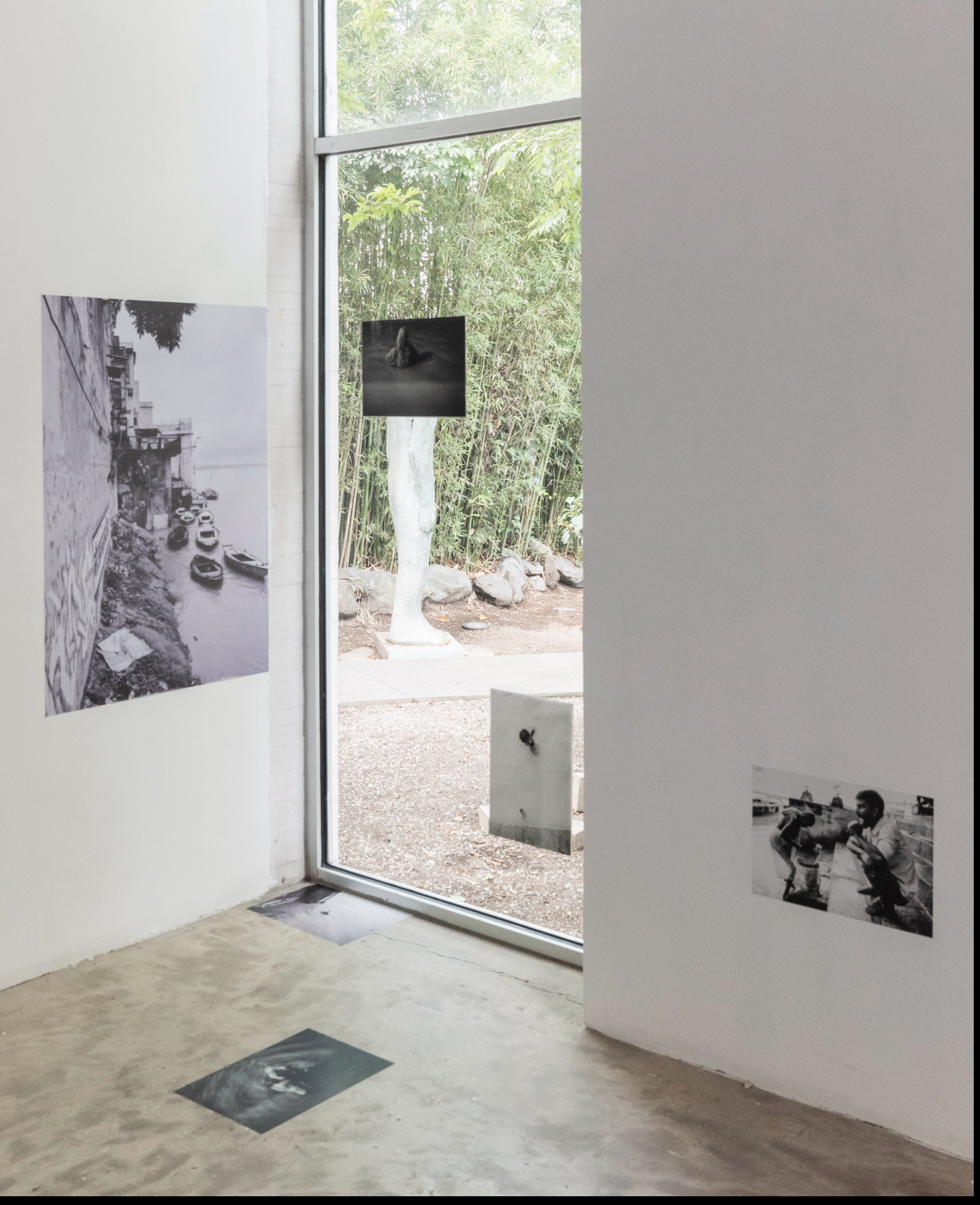 Threshold — adhesive polyester print pasted on glass, the garden beyond