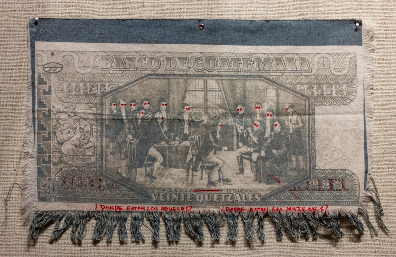 Cyanotype print of the Banco de Guatemala 20 Quetzales note — on manta española, polyester/cotton 73/27 blend, coffee-toned, hand de-threaded, inscribed with a quote from an indigenous leader at a protest in front of the presidential palace, Guatemala City: the 20 quetzal bill depicts the signing of independence from Spain, and the abuelos and the women are absent from that ceremony