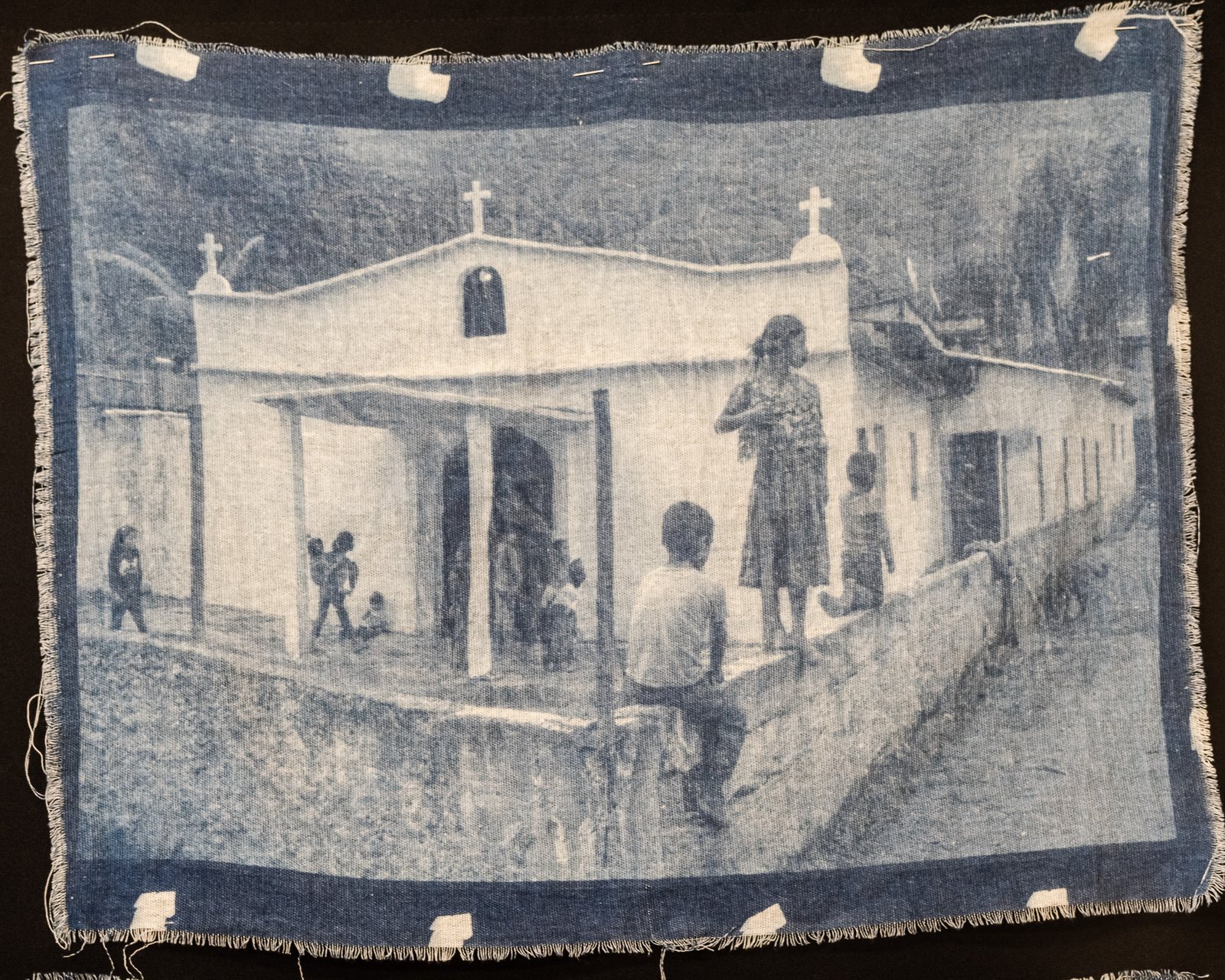 Women under umbrellas, child seated on chair — cyanotype on cotton