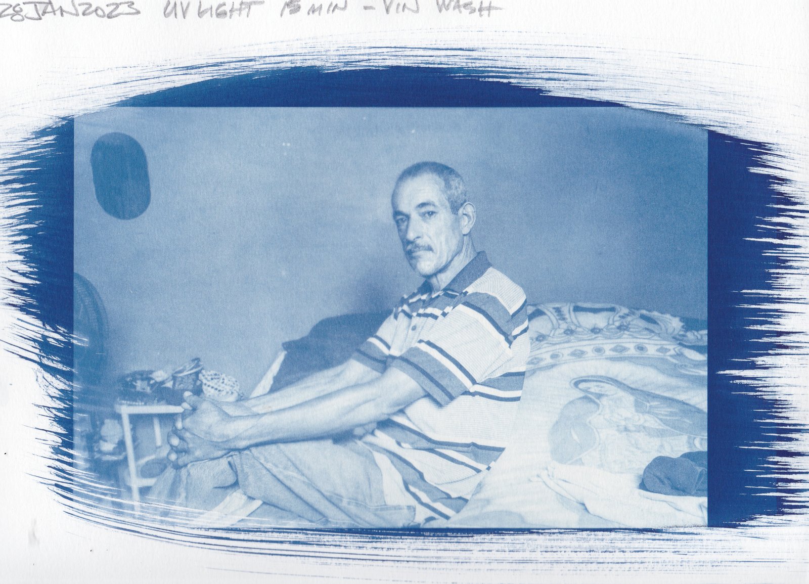 Paper test — elder woman in headscarf and patterned dress, vinegar-toned cyanotype on paper, 15min UV exposure, 28 Jan 2023